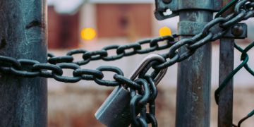 Security lock and chain on gate