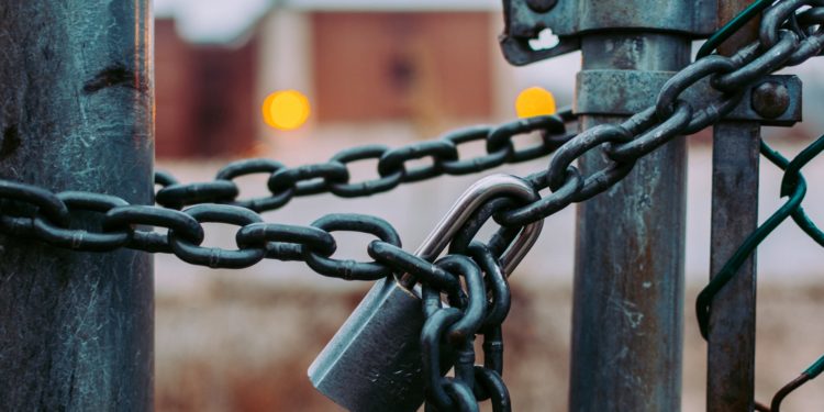 Security lock and chain on gate