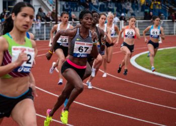 Female athletes running a sports race