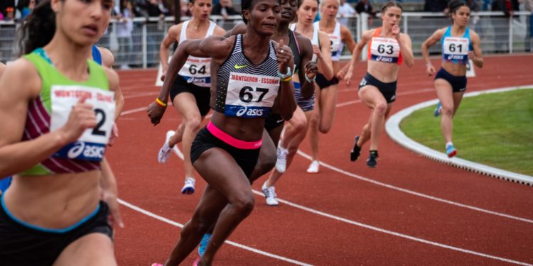 Female athletes running a sports race