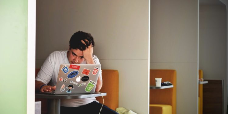 stressed man working from home