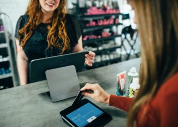 Customer paying with card reader
