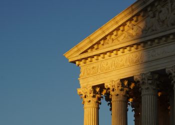 The US supreme court roof top at dawn