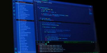 A dark computer screen with code