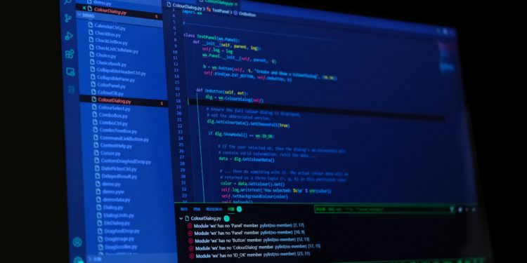 A dark computer screen with code