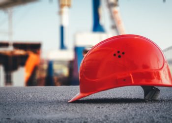 A construction hard hat at a construction site