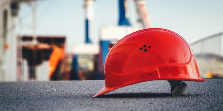 A construction hard hat at a construction site