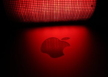 Apple logo shadowed in a red light