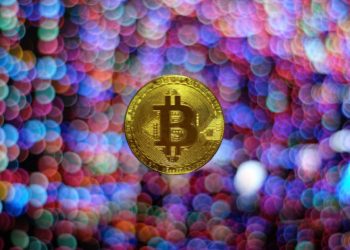 Bitcoin surrounded by colourful dots of light. The colour scheme revolves around purple tones