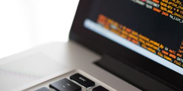 Macbook displaying code