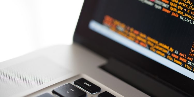 Macbook displaying code