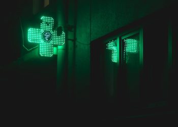 Pharmacy cross in neon lights