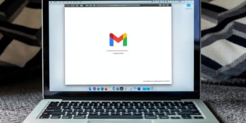 Gmail icon on an open Macbook