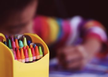 child colouring something