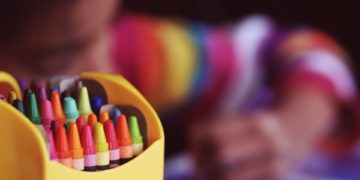 child colouring something