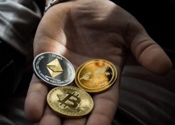 Crypto currency being held in a hand