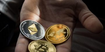 Crypto currency being held in a hand