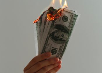 Burning dollar notes