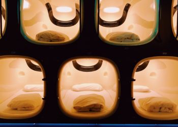 Capsule hotel rooms lit up