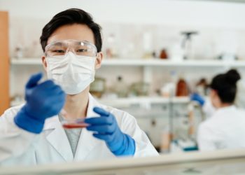Chemist conducting experiment