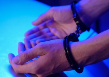 hands in handcuffs