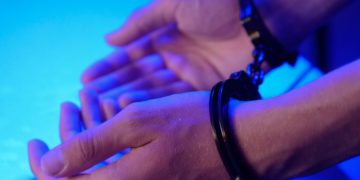 hands in handcuffs