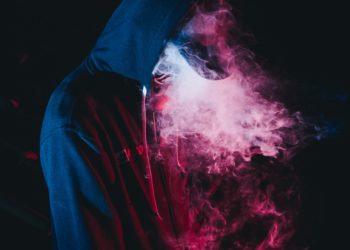 hooded man vaping