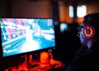 person playing game on computer