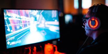 person playing game on computer