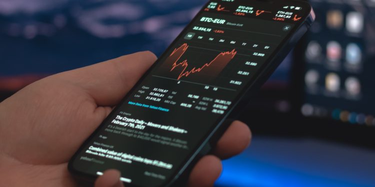 phone screen displaying stock trading app
