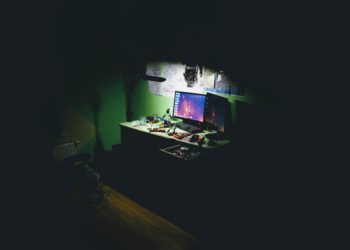 Computer in dark room