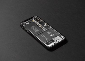 Smartphone with screen removed to reveal circuit board