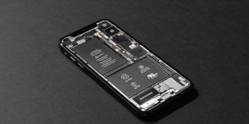 Smartphone with screen removed to reveal circuit board