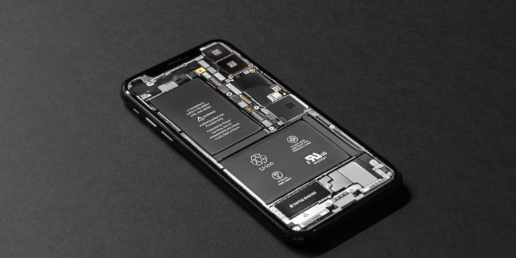 Smartphone with screen removed to reveal circuit board