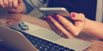 Laptop, phone, hands