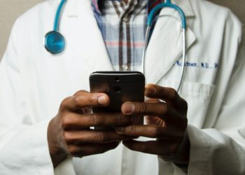 Doctor holding phone