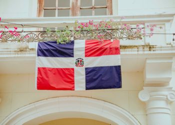 Red and Blue flag, white cross. Dominican Republic Flag.