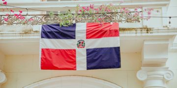 Red and Blue flag, white cross. Dominican Republic Flag.