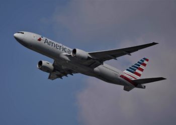 An aeroplane flying through the sky