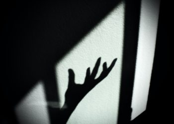 Shadowed hand