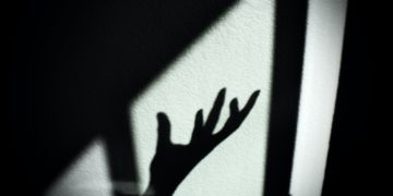 Shadowed hand